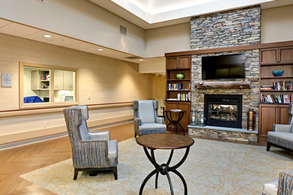 Heritage Manor inside lobby with fireplace