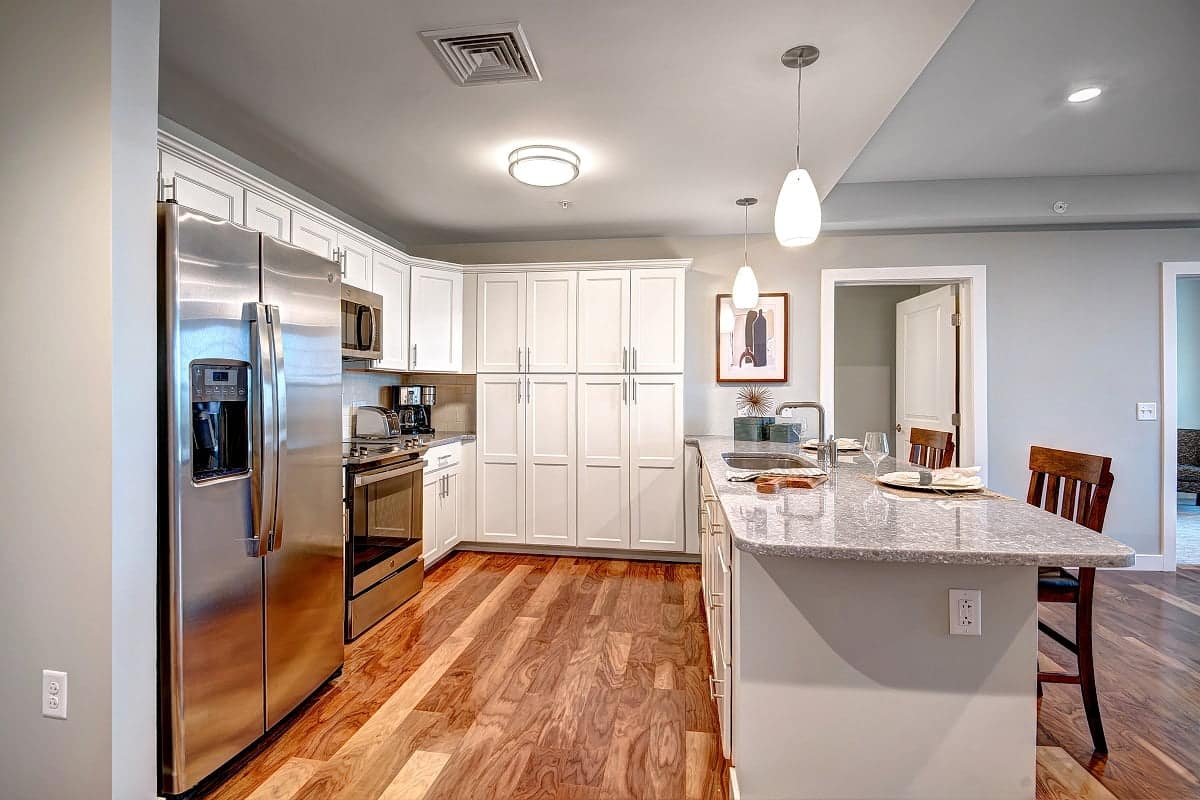 The white cabinets in the new kitchens.