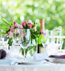 A table with a floral centerpiece.